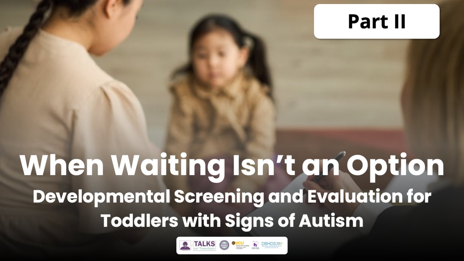 Mother and EI specialist converse while watching child play