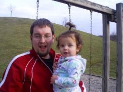 father holding his toddler