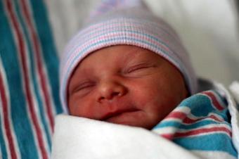 infant in a blanket