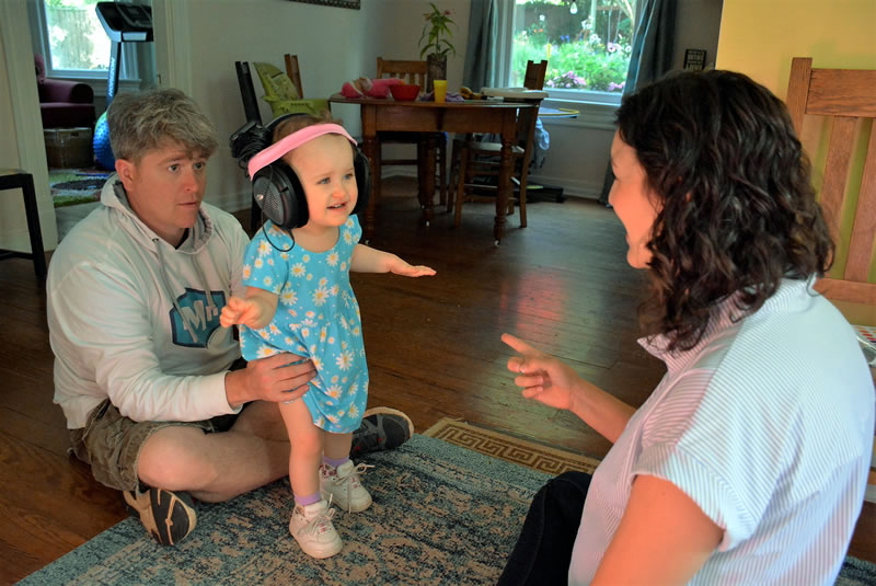 Toddler working with Early Intervention Specialist and Parent